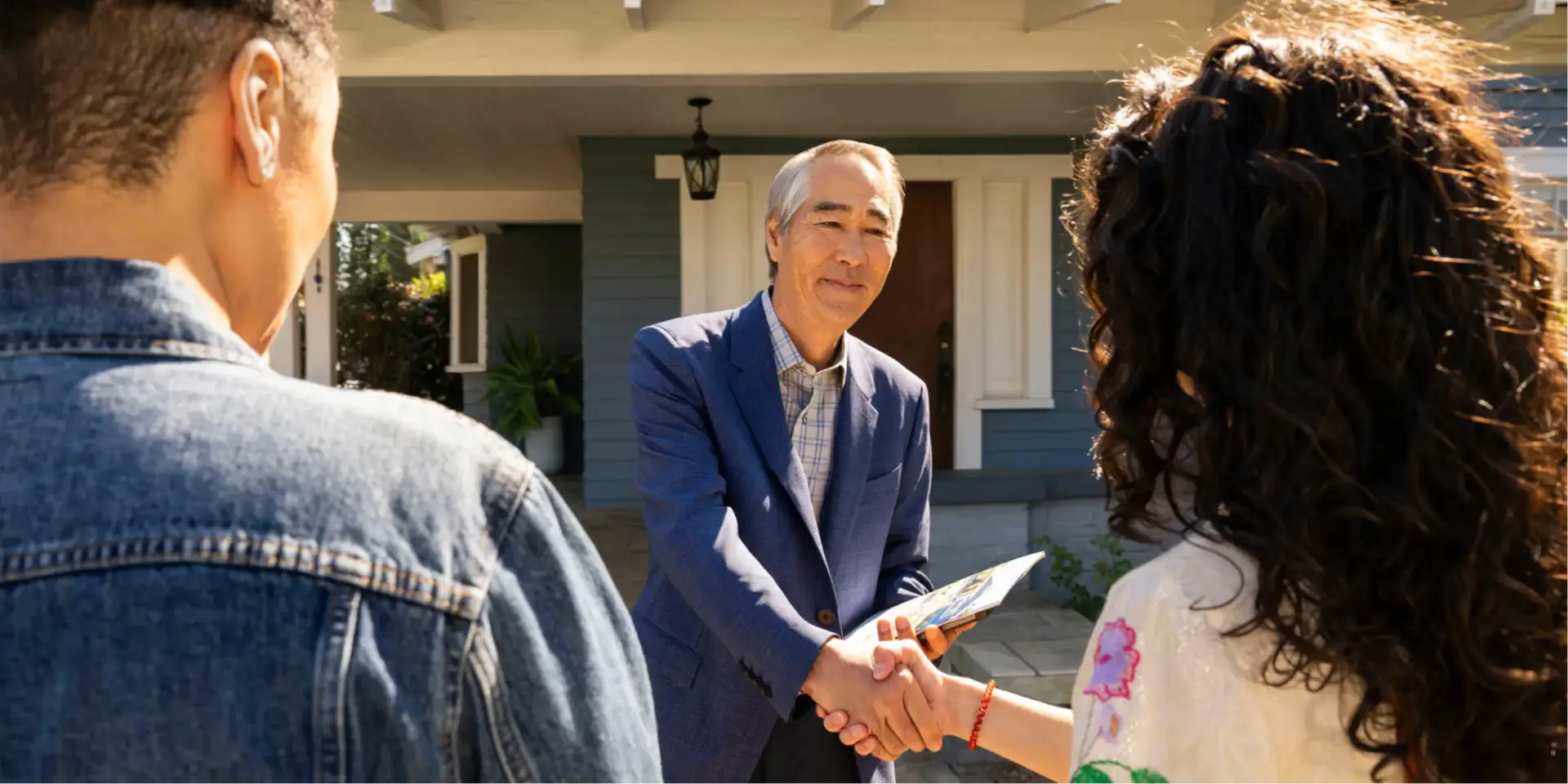 Real estate agent helping clients